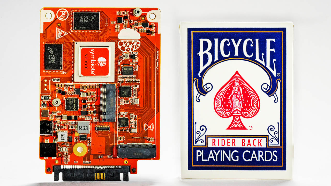 Symbiote bare metal server next to a deck of cards